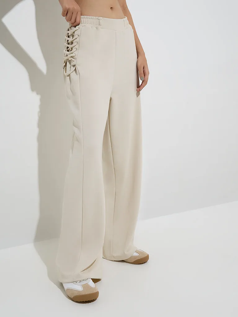 Studiofit Cream Criss-Cross Detailed High-Rise Track Pants