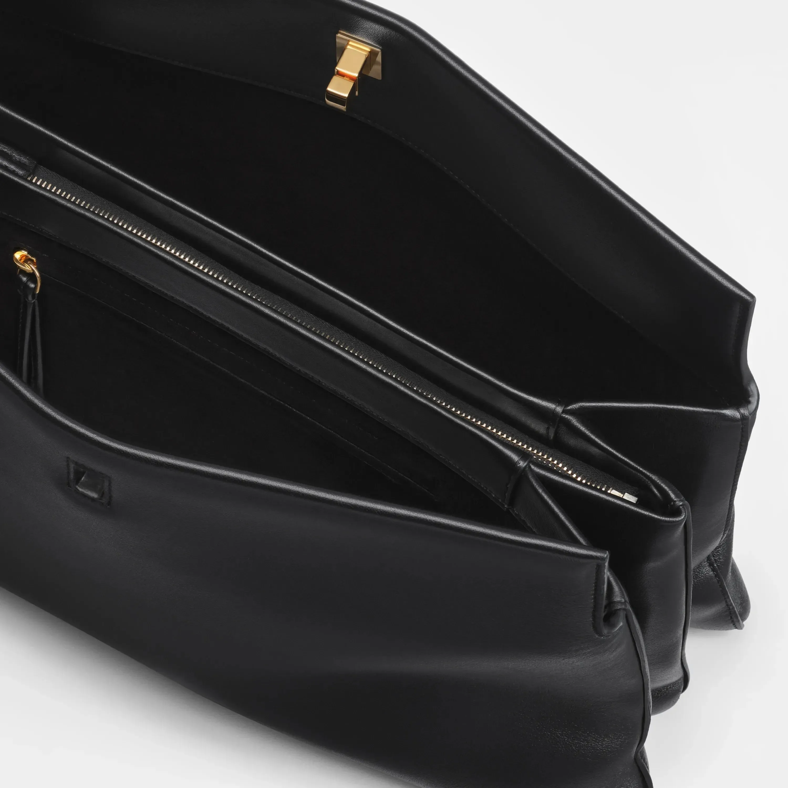 TRIPLEX CLUTCH | black leather with gold
